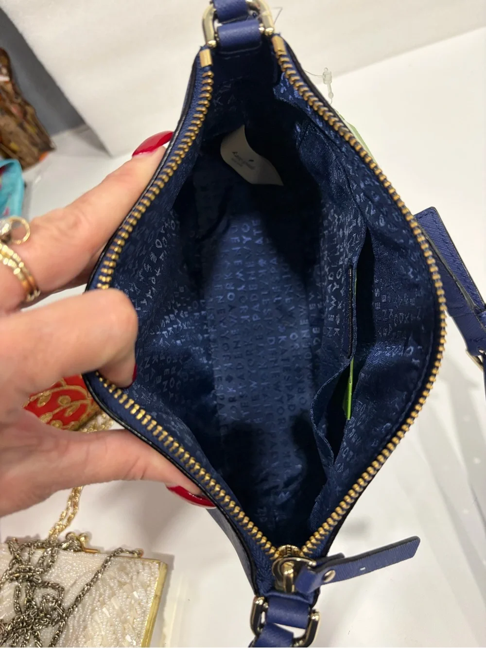 kate spade navy leather crossbody with blue sea turtle appliqués